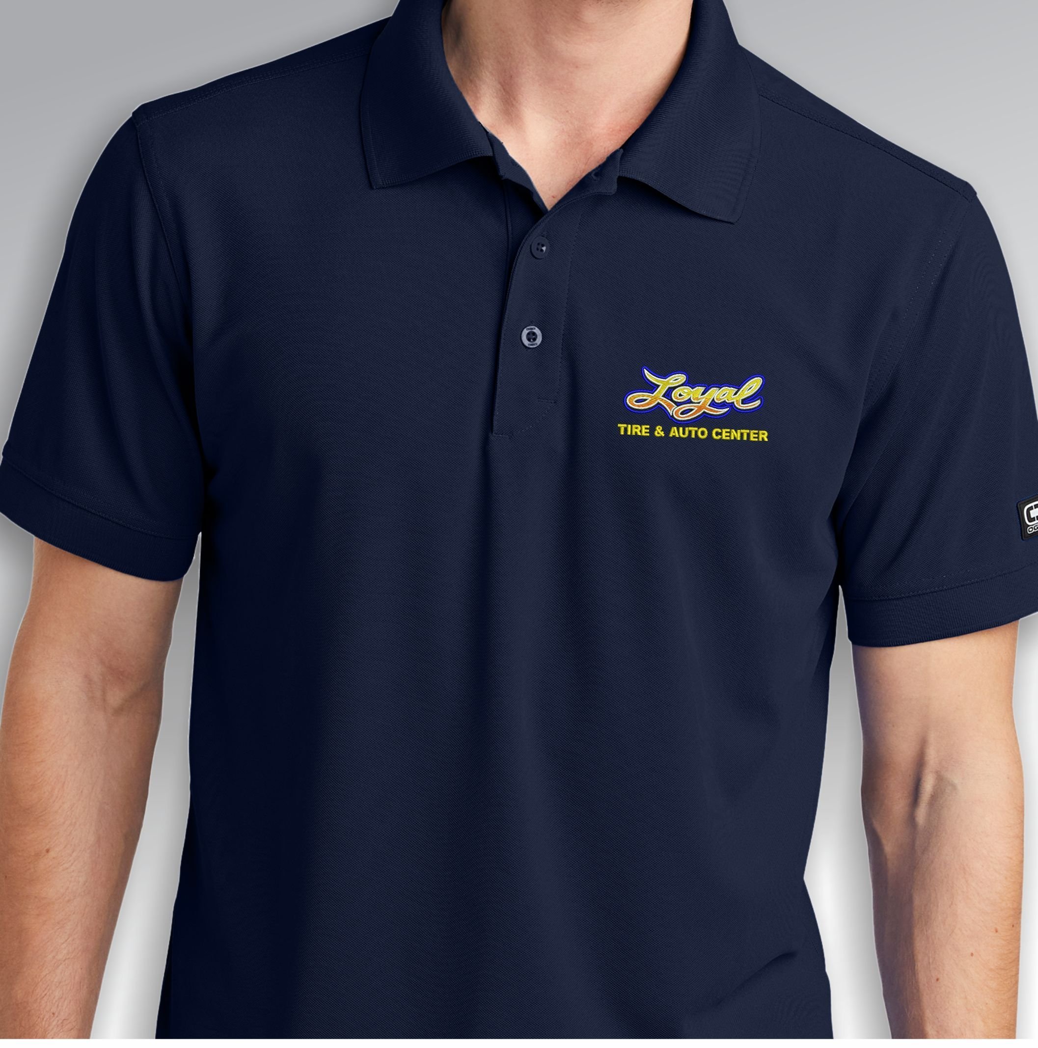Navy polo with Loyal Tire logo